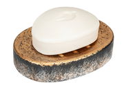 Seifenablage Lacona mit ovaler Form, goldener Oberfläche und schwarzem Rand, von oben fotografiert, mit einem Stück Seife darauf.