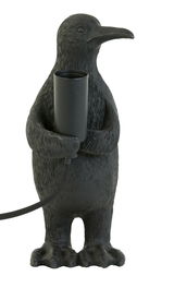 Schwarze Tischleuchte in Form eines Pinguins, der eine Lampenfassung hält. Frontalansicht.