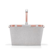 Frontansicht eines grauen Einkaufskorbs mit rosafarbenem Griff und Rahmen.