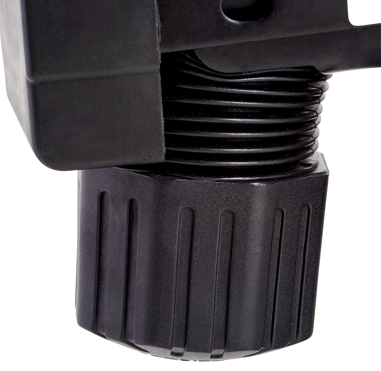 Nahaufnahme eines schwarzen Drehknopfes an einem Drehstuhlmechanismus, seitliche Perspektive.