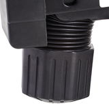 Nahaufnahme eines schwarzen Drehknopfes an einem Drehstuhlmechanismus, seitliche Perspektive.