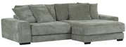 Grünes Ecksofa mit mehreren Kissen, Vorderansicht