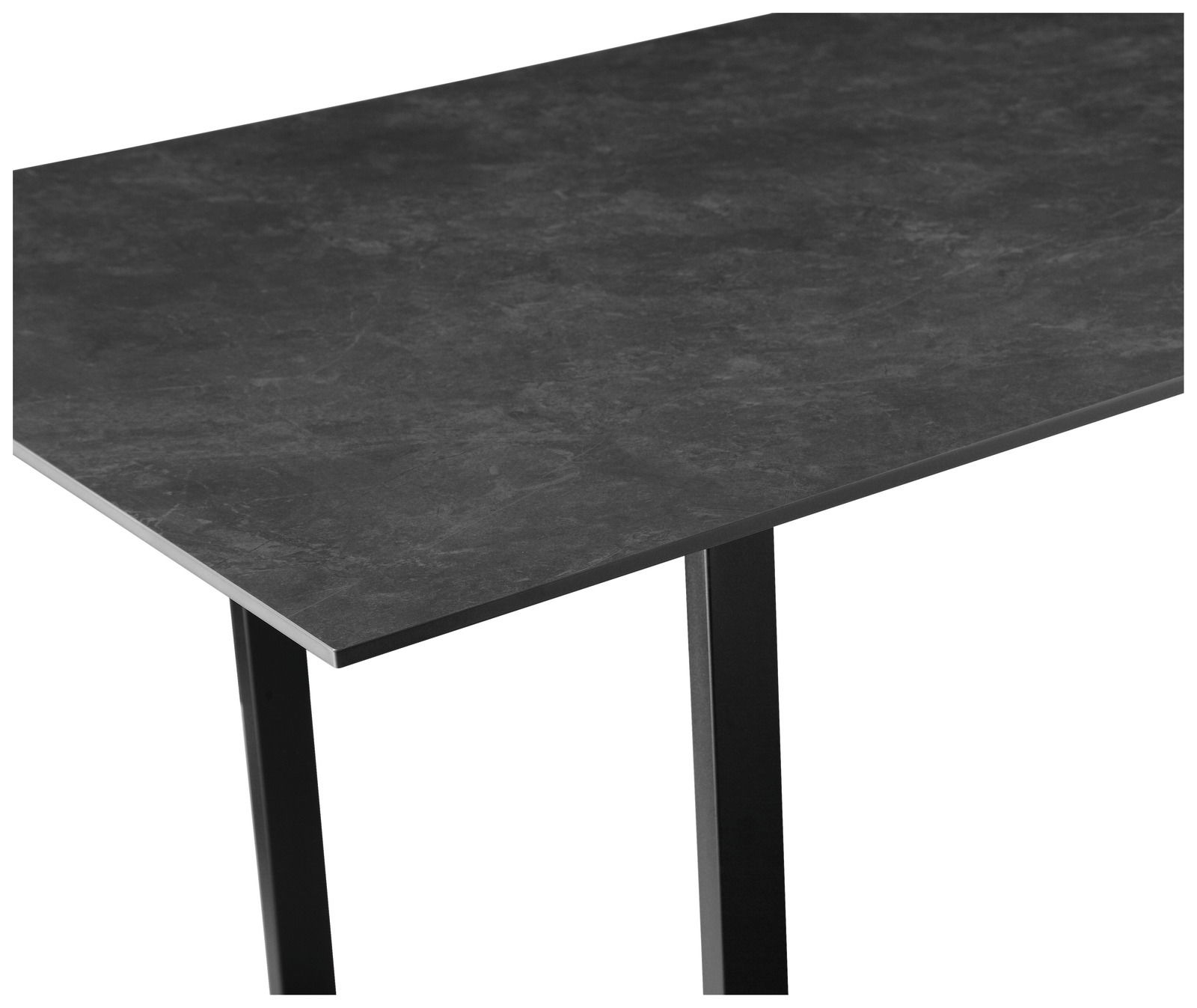 Moderner Esstisch mit dunkler Tischplatte und schlanken, schwarzen Beinen, seitliche Perspektive