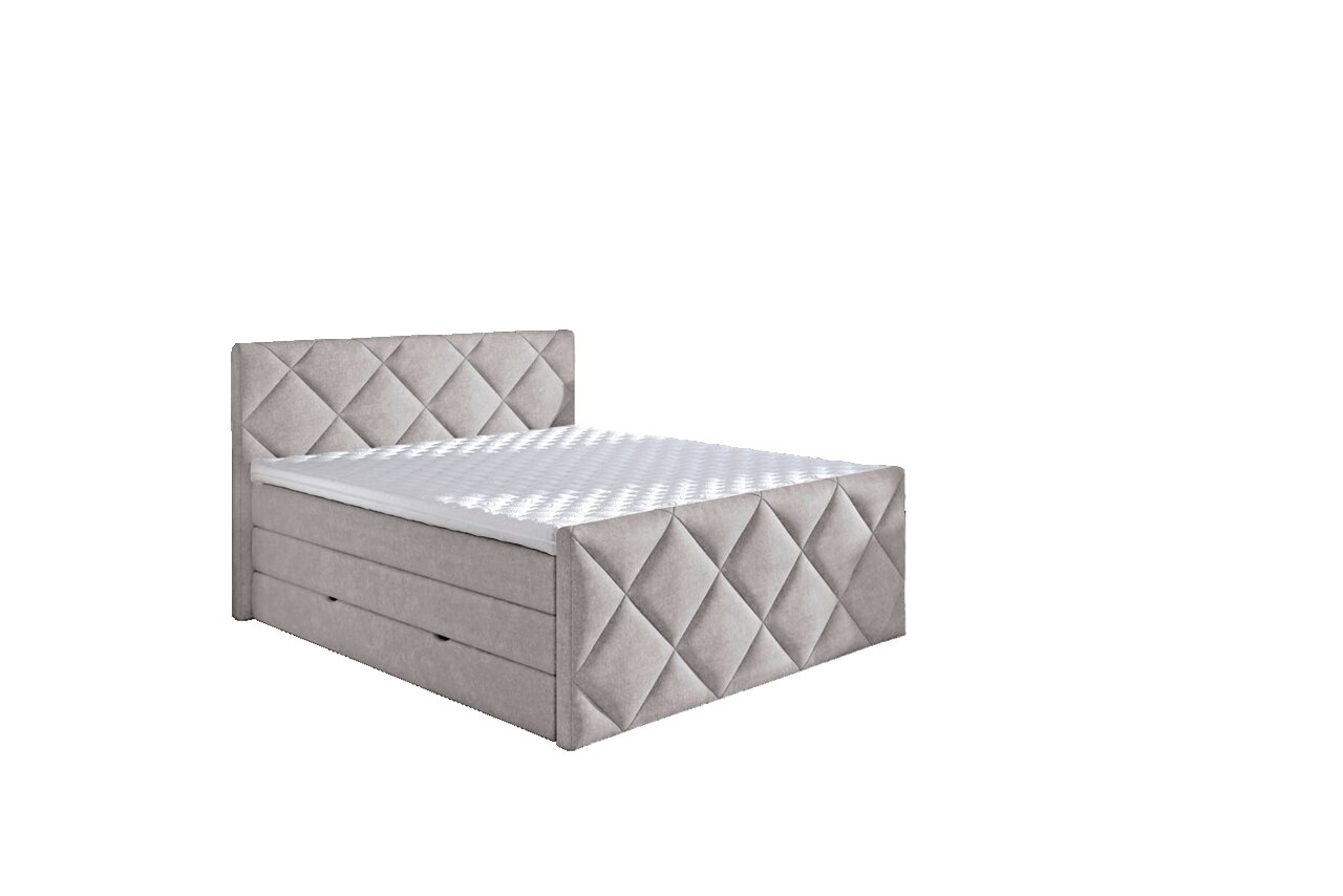 Boxspringbett in einem modernen Schlafzimmer mit seitlicher Perspektive, umgeben von stilvollen Möbeln und dekorativen Elementen.