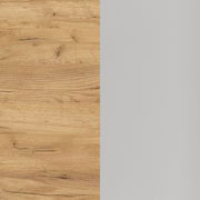 Nahaufnahme einer Tischplatte mit Holzoptik auf der linken Seite und grauer Oberfläche auf der rechten Seite.