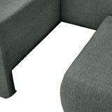 Nahaufnahme einer grauen Recamiere mit strukturiertem Stoffbezug, Blick auf die Ecke der Sitzfläche.