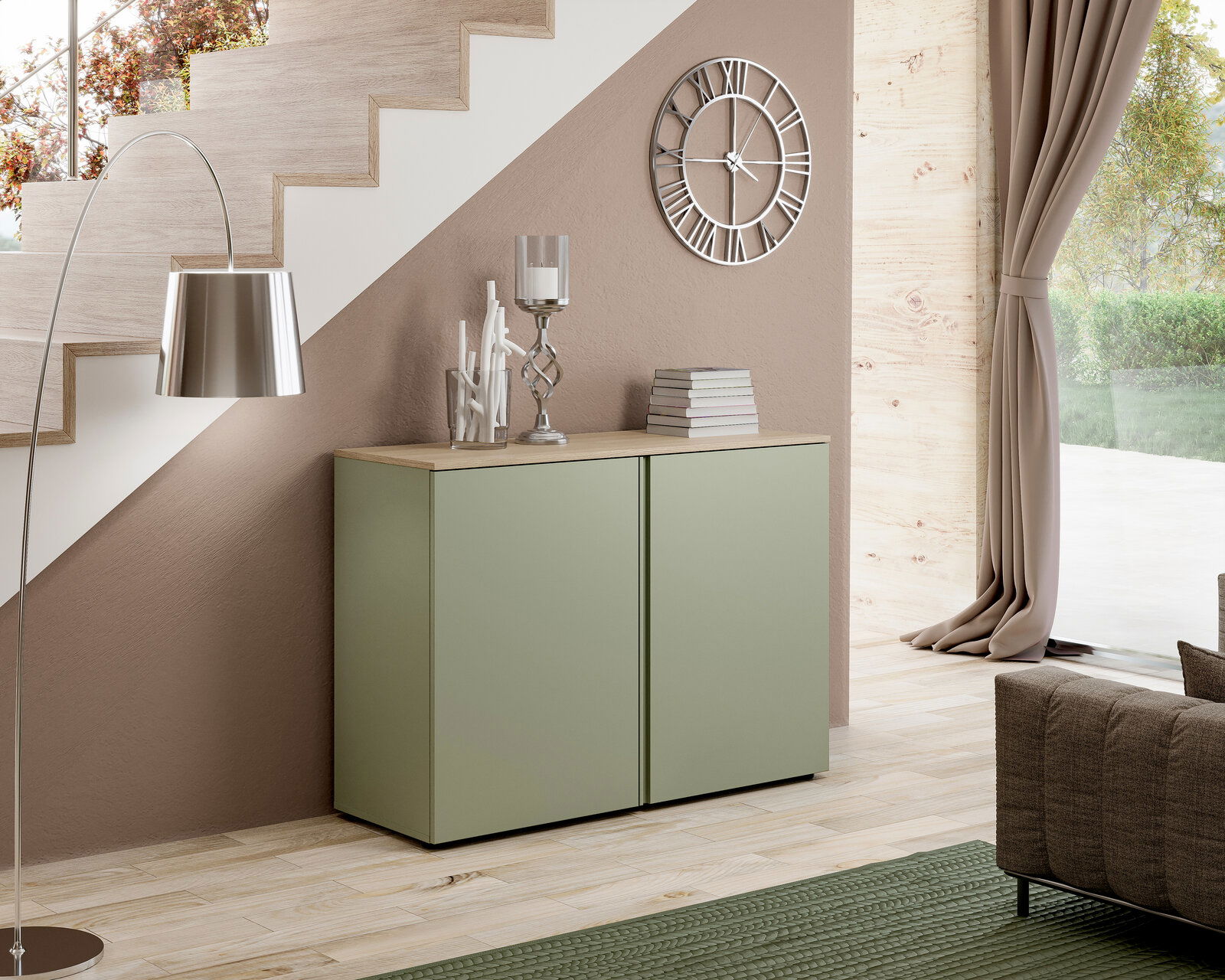 Moderne grüne Kommode mit zwei Türen, seitliche Perspektive, unter einer Treppe platziert, dekoriert mit Büchern und Kerzenhalter.