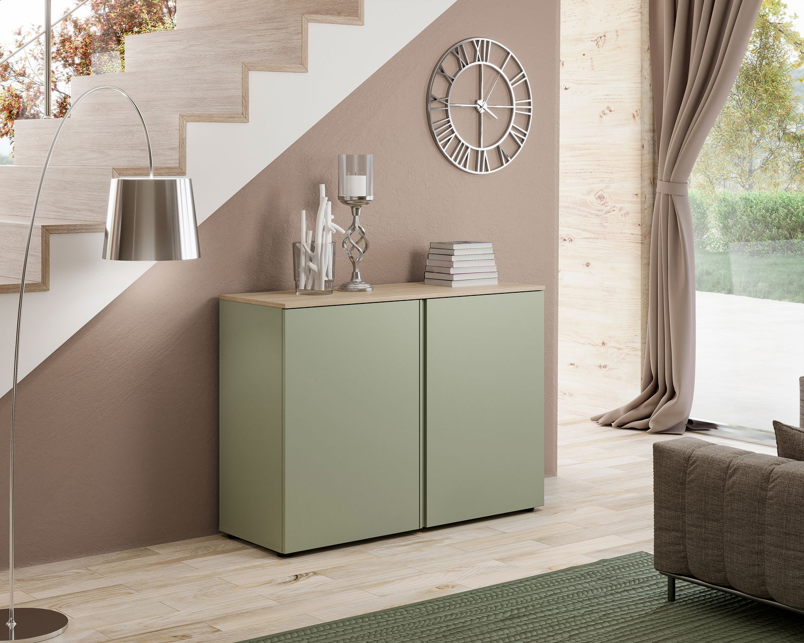 Moderne grüne Kommode mit zwei Türen, seitliche Perspektive, unter einer Treppe platziert, dekoriert mit Büchern und Kerzenhalter.