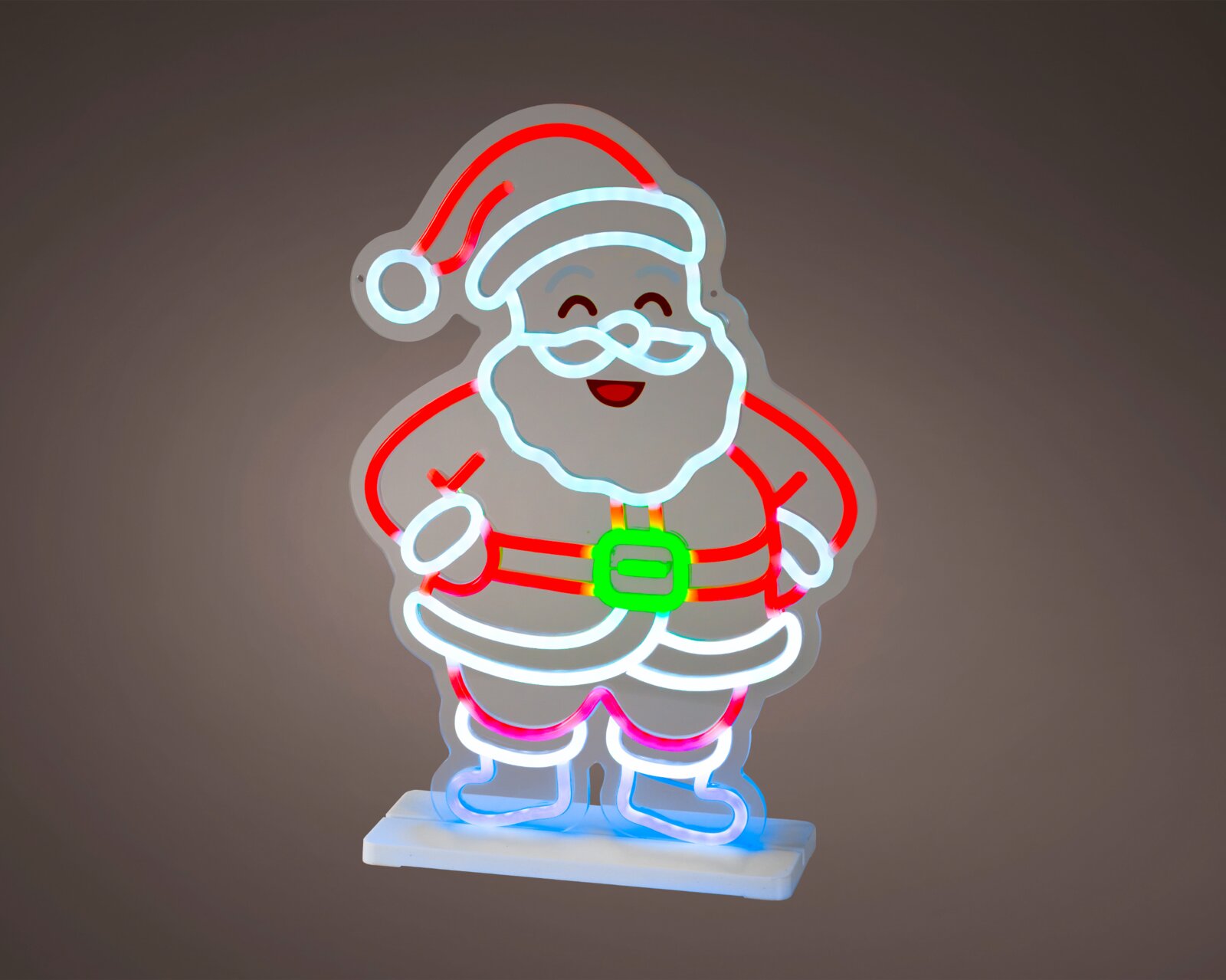 Leuchtende Weihnachtsmann-Dekoration im Neon-Look mit roten, weißen, grünen und blauen Konturen auf einem weißen Standfuß, frontal aus leichter Seitenperspektive gezeigt.