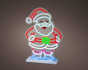 Leuchtende Weihnachtsmann-Dekoration im Neon-Look mit roten, weißen, grünen und blauen Konturen auf einem weißen Standfuß, frontal aus leichter Seitenperspektive gezeigt.