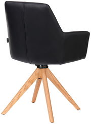 Rückansicht eines schwarzen Armlehnstuhls mit Holzbeinen