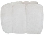 Rückansicht eines großen, beigen Sofas mit strukturierter Oberfläche.