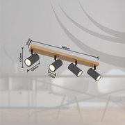 Deckenstrahler aus Metall in Graphit dunkel mit vier verstellbaren Leuchten, montiert auf einer Holzleiste. Perspektive: seitliche Ansicht.