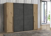 Moderner Dreh- und Schwebetürenschrank NARAGO in Holzoptik mit grauen Türen, seitliche Perspektive