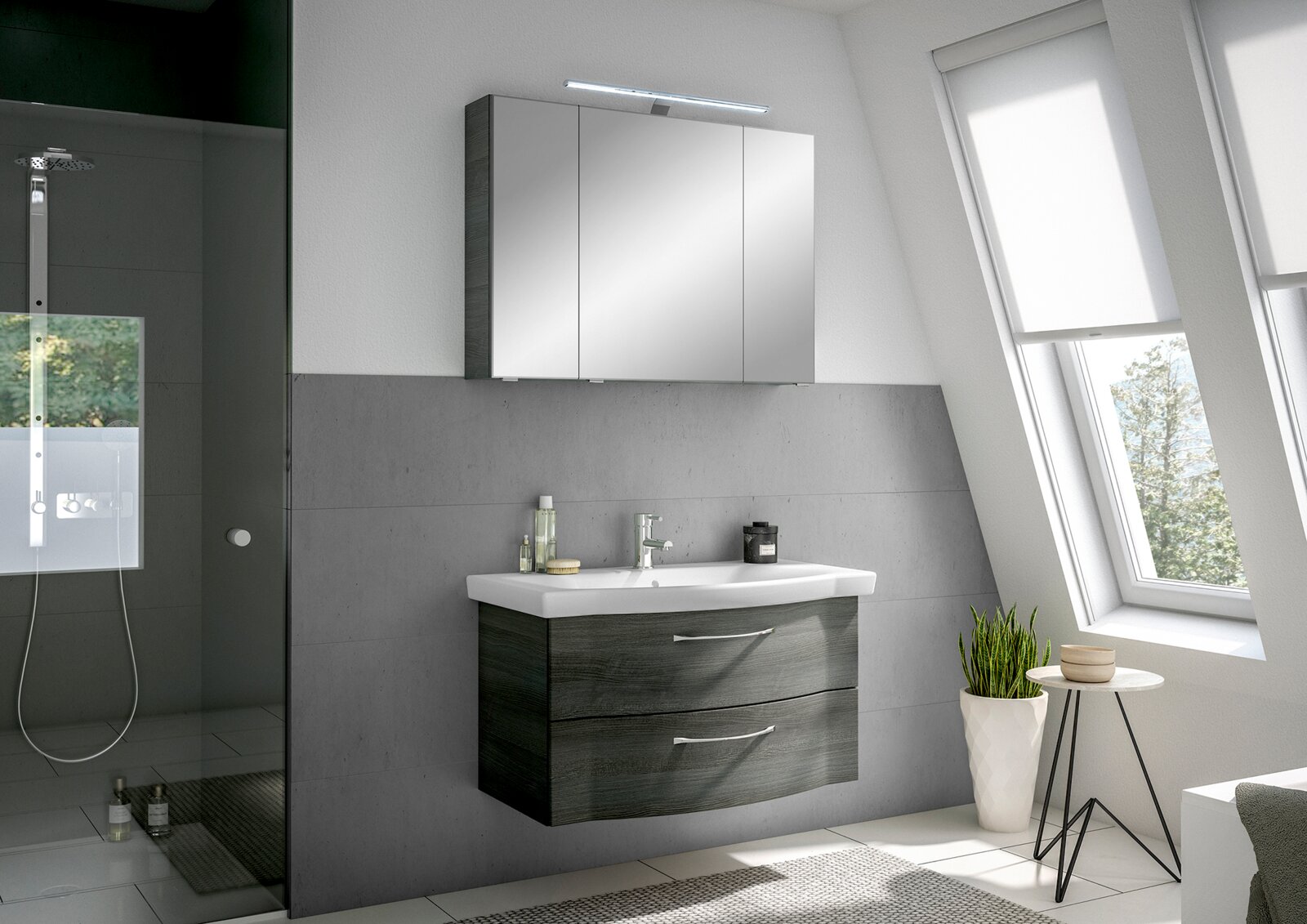 Moderner Badblock mit Spiegel und Waschbecken in einem stilvollen Badezimmer, seitliche Perspektive.