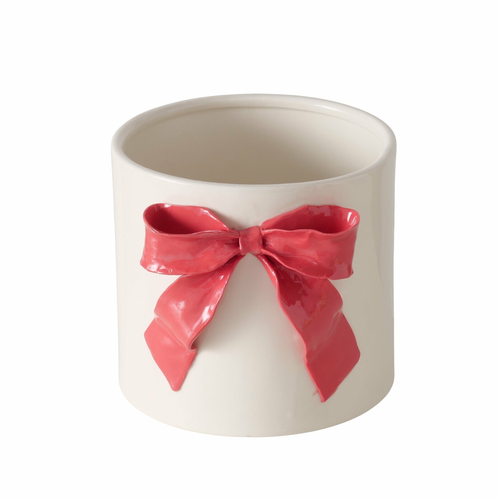 Weißer Übertopf aus Porzellan mit roter Schleife, frontal fotografiert.