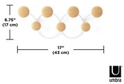 Vorderansicht der Umbra Wandgarderobe DOTSY mit fünf runden Holzhaken auf weißem Hintergrund, Maße 17 cm hoch und 43 cm breit.