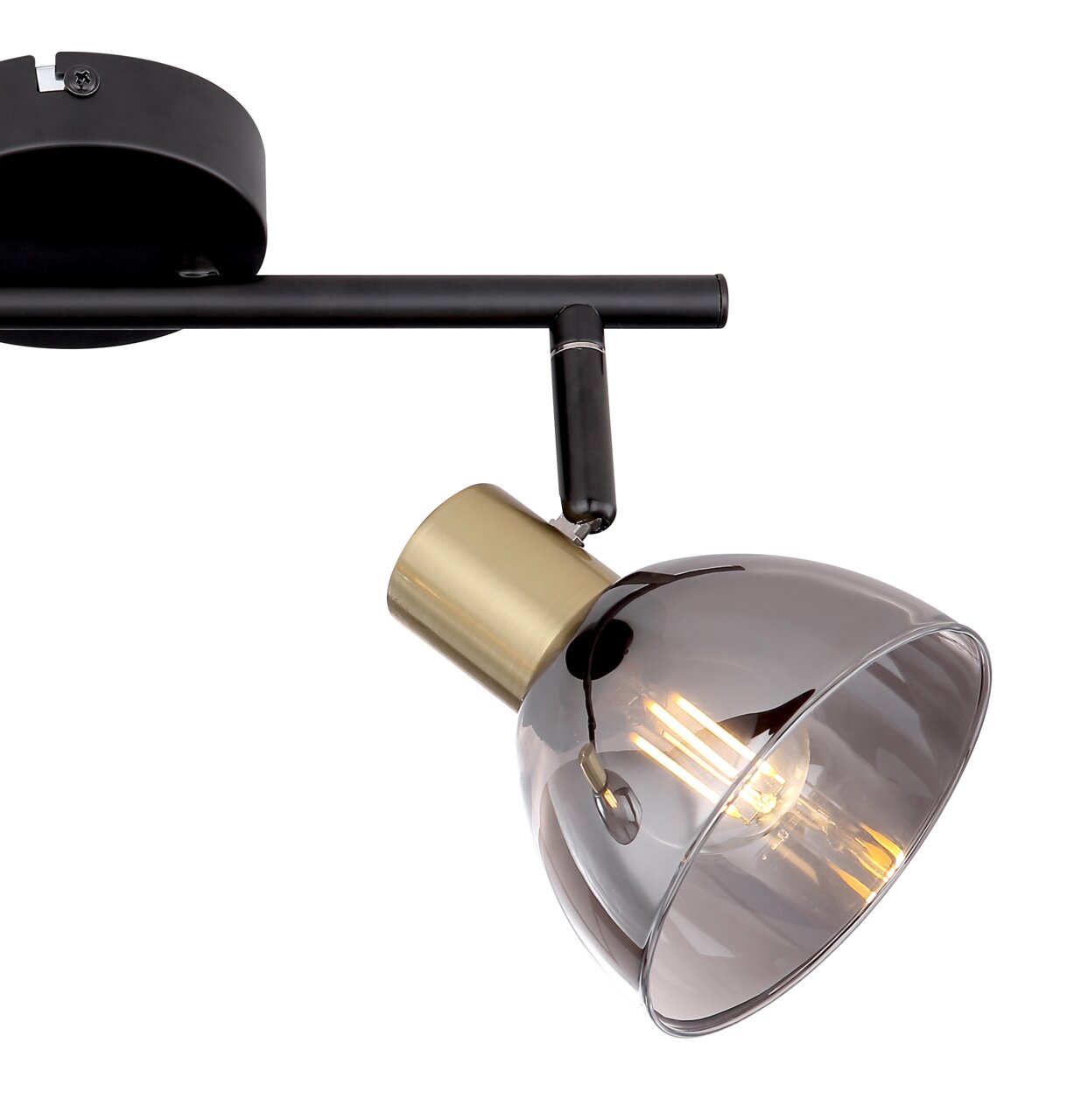 Moderner Strahler aus schwarzem Metall mit einem schwenkbaren, rauchgrauen Glasschirm und goldfarbenem Akzent, seitliche Perspektive.