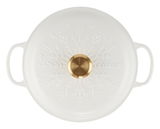 Top-Ansicht eines weißen Gourmet-Profipfanne mit Schneeflocken-Design und goldfarbenem Knauf.