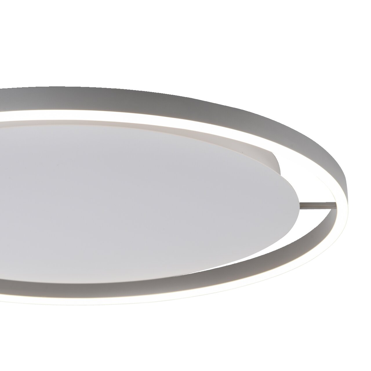 Moderne plafondlamp RITUS in zijaanzicht, met een cirkelvormig ontwerp en een verlichte rand.