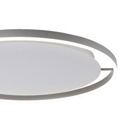 Moderne plafondlamp RITUS in zijaanzicht, met een cirkelvormig ontwerp en een verlichte rand.
