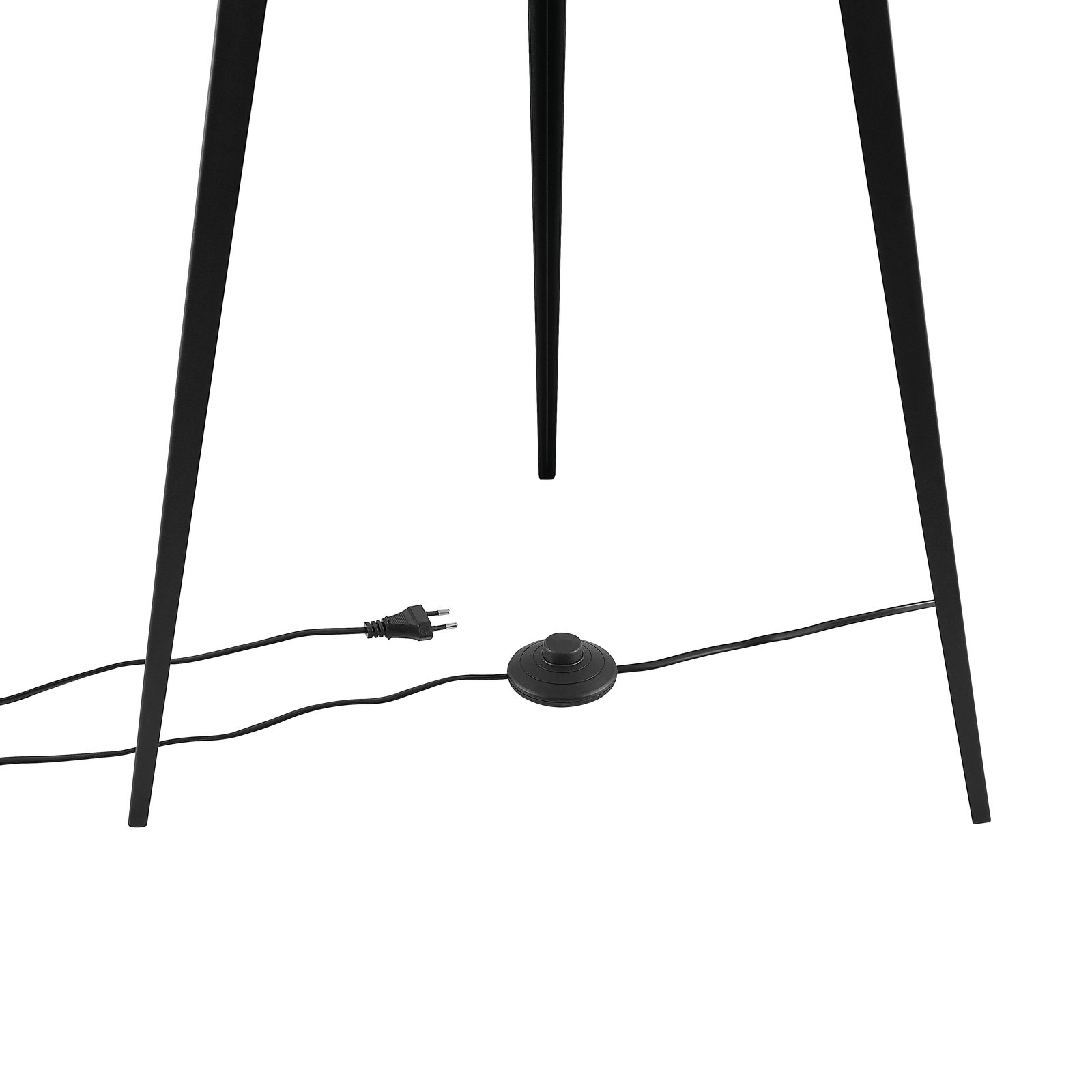 Nahaufnahme der unteren Hälfte einer schwarzen Stehleuchte mit drei Beinen und einem Fußschalter auf dem Boden.