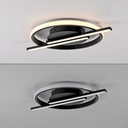 Moderne LED-Deckenleuchte mit kreisförmigem Design und zwei überkreuzten Leuchtstreifen, seitliche Perspektive.