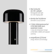 Schwarze Akku-Tischleuchte AGNES mit zylindrischem Sockel und rundem Lampenschirm, seitliche Perspektive.