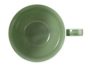 Grüne Milchkaffeetasse mit Henkel, von oben betrachtet