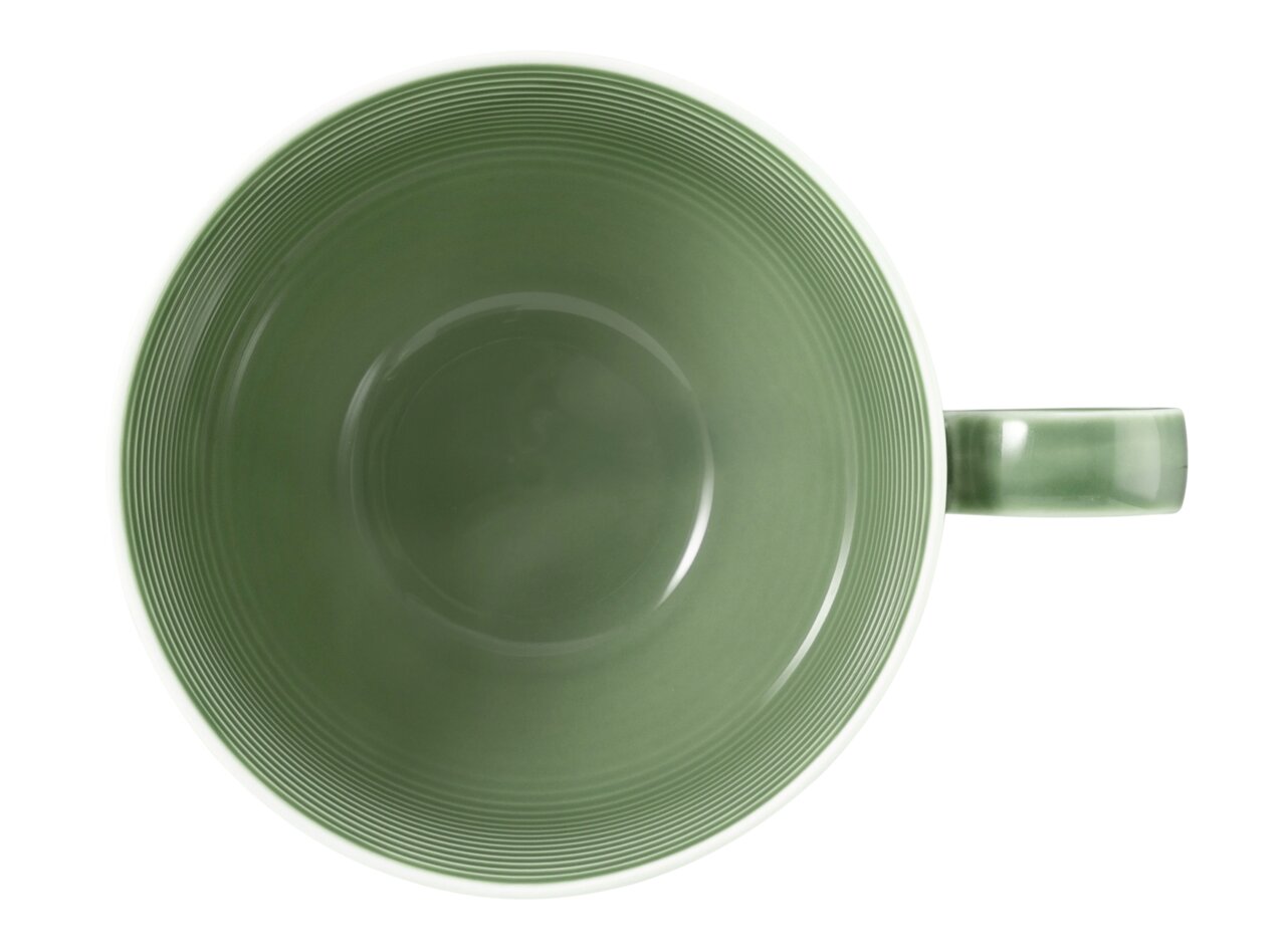 Grüne Milchkaffeetasse mit Henkel, von oben betrachtet