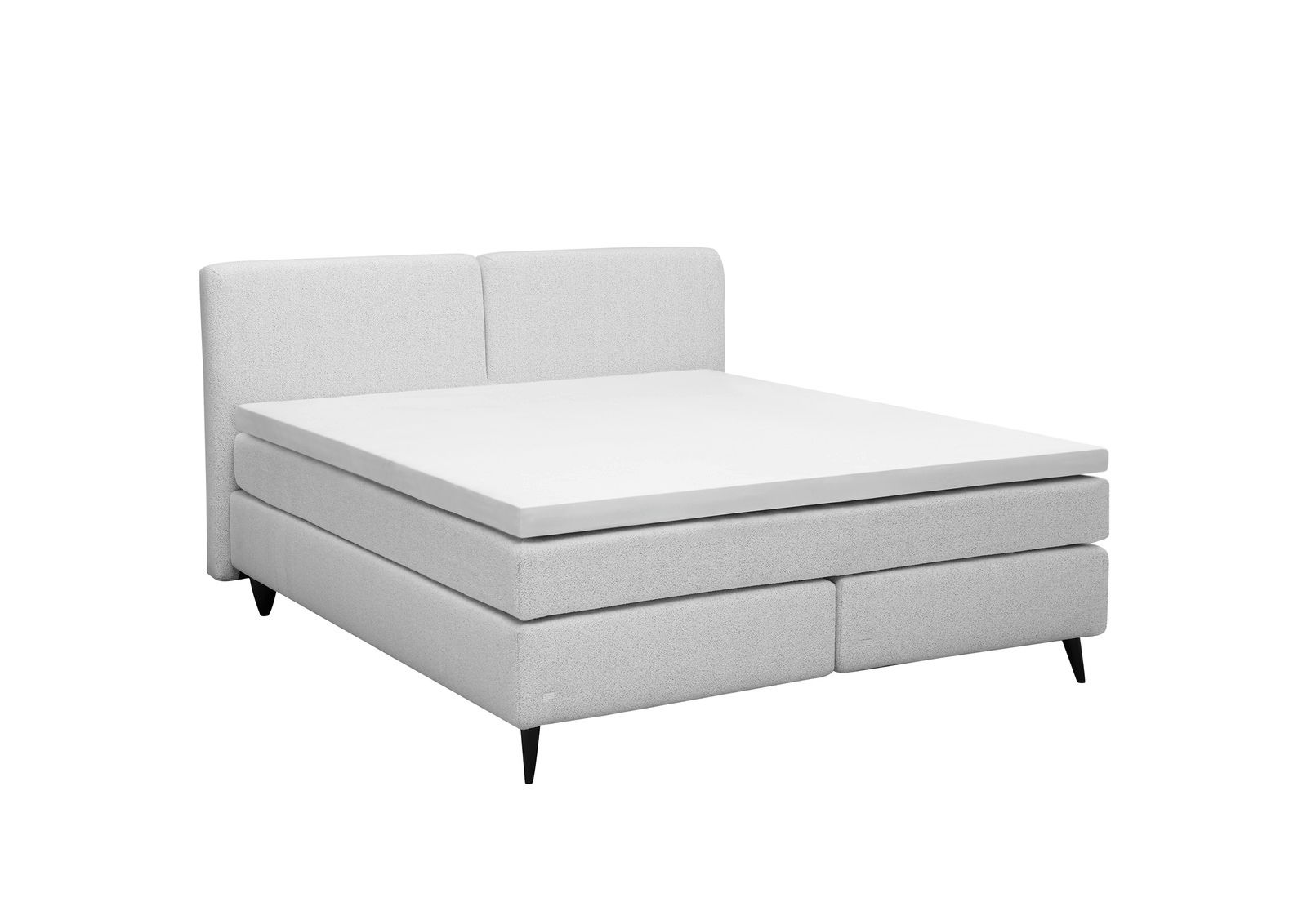 Boxspringbett in hellem Stoffbezug, seitliche Perspektive