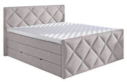 Boxspringbett in grauem Stoff mit gestepptem Kopf- und Fußteil, seitliche Perspektive