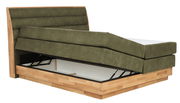 Boxspringbett mit hochgeklappter Matratze und Stauraum, seitliche Perspektive