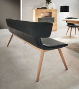 Moderne Bank mit schwarzer Polsterung und Holzbeinen, Rückansicht