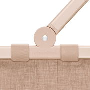 Nahaufnahme des oberen Teils eines Carrybag-Rahmens in der Farbe Twist Coffee mit sichtbarem Griffgelenk und Textilbespannung.