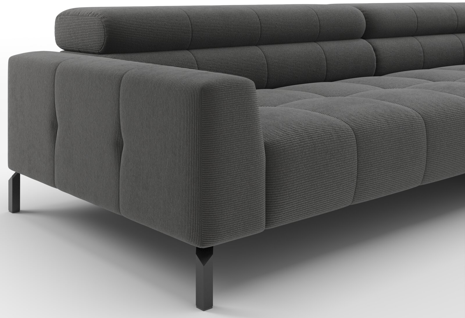 Donkergrijze modulaire bank met ribstof bekleding, blokstiksels en zwarte metalen poten, schuin van voren links gefotografeerd