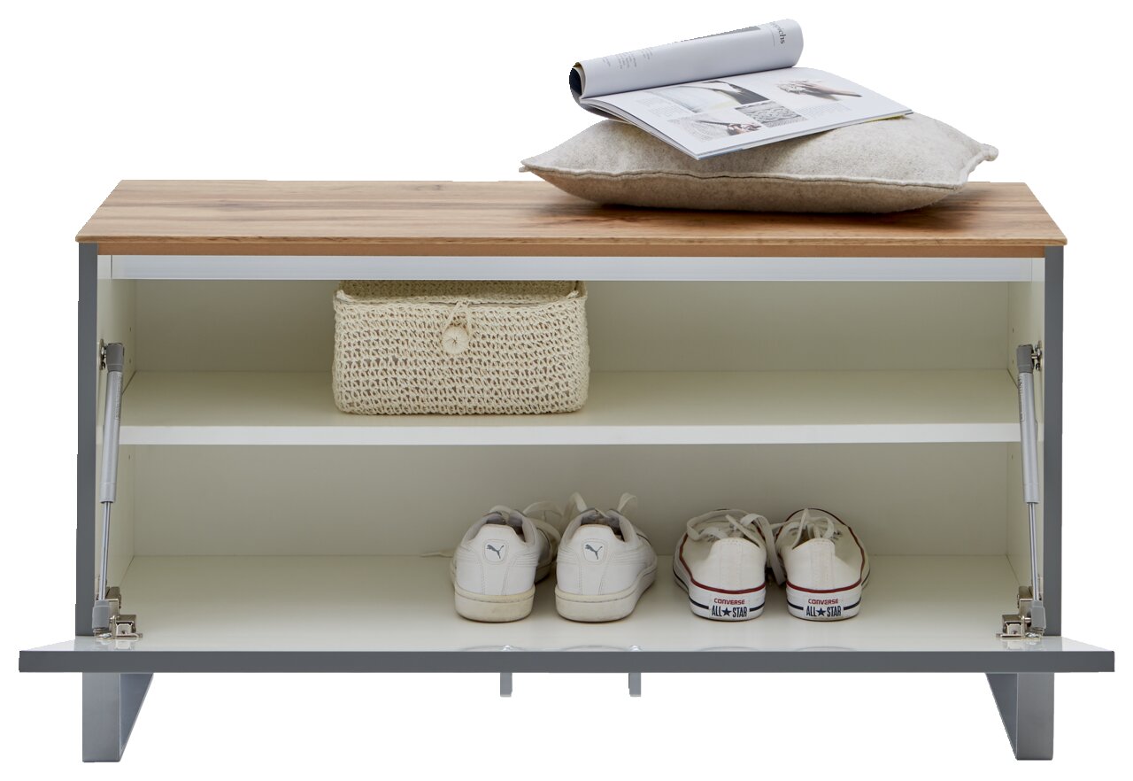 Dieter Knoll Garderobenbank CORTINA Garderobenbank mit Holzoberfläche, zwei offenen Fächern, einem Kissen und einer Zeitschrift auf der Oberseite, frontal betrachtet.