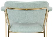 Rückansicht eines Armlehnstuhls mit hellgrünem Stoffbezug und goldfarbenem Metallrahmen.