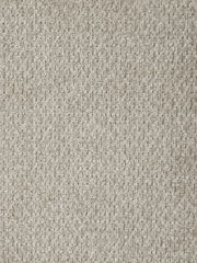 Nahaufnahme des Stoffmusters eines Armlehnstuhls THORSTEN in beige, von oben betrachtet.