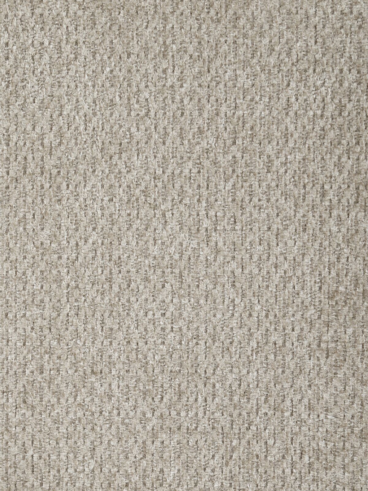 Nahaufnahme des Stoffmusters eines Armlehnstuhls THORSTEN in beige, von oben betrachtet.