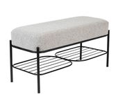 Graue Sitzbank mit schwarzem Metallgestell und zwei Ablagen, seitliche Perspektive