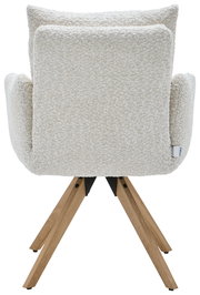 Rückansicht eines Armlehnstuhls mit cremefarbenem Stoffbezug und Holzbeinen.