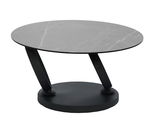 Moderner Couchtisch mit runder, grauer Tischplatte und schrägen schwarzen Beinen, seitliche Perspektive