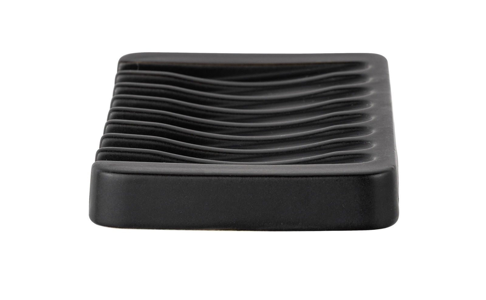 Keramik Seifenablage Soliera in Schwarz, seitliche Perspektive mit wellenförmigem Design