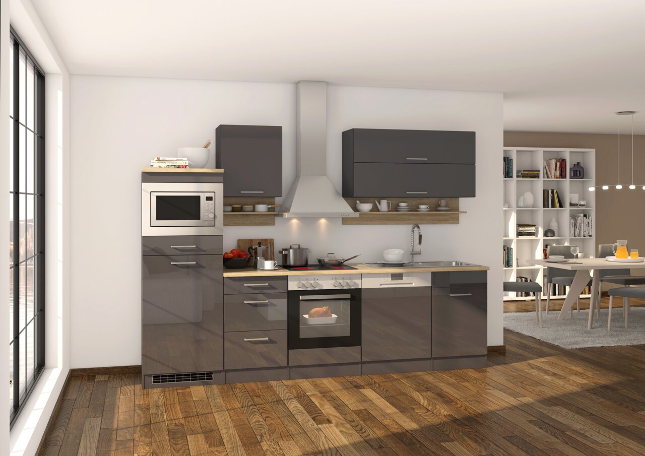Moderne Küchenzeile in dunklem Grau mit eingebautem Backofen, Mikrowelle und Dunstabzugshaube, seitliche Perspektive.
