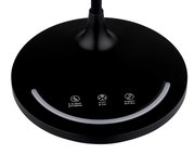 Nahaufnahme der Basis einer schwarzen Tischleuchte mit Touch-Bedienelementen für Helligkeit, Farbtemperatur und Verzögerung. Ansicht von oben.