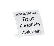 Etikett mit den Aufschriften Knoblauch, Brot, Kartoffeln, Zwiebeln, aus seitlicher Perspektive fotografiert.
