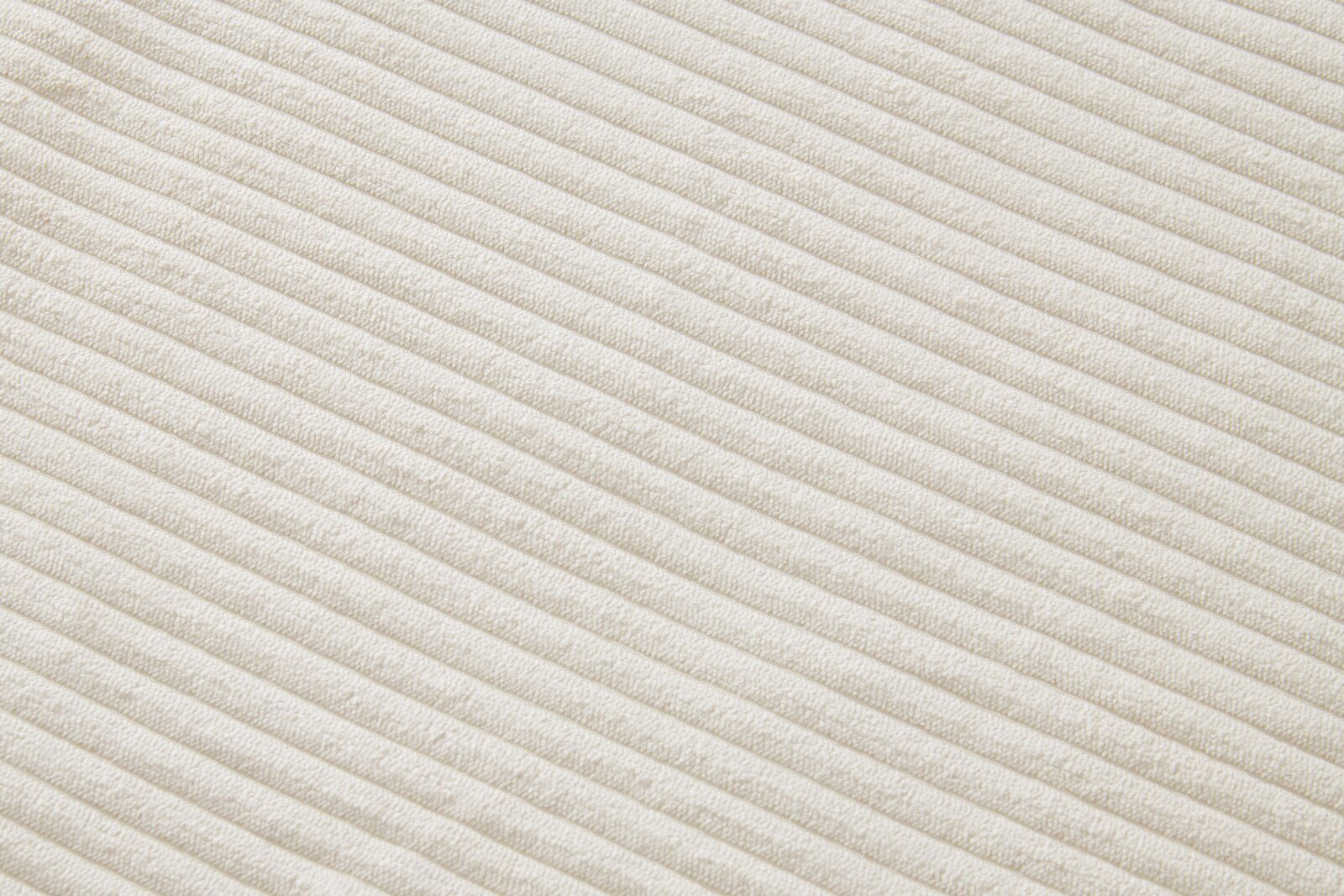 XORA Armlehnstuhl JESSY Nahaufnahme eines cremefarbenen, gerippten Stoffes in diagonaler Perspektive.