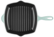 Quadratische Grillpfanne mit geriffelter schwarzer Bratfläche und hellmintfarbenem Griff, Draufsicht von oben