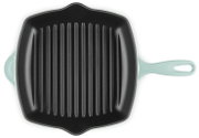 Quadratische Grillpfanne mit geriffelter schwarzer Bratfläche und hellmintfarbenem Griff, Draufsicht von oben